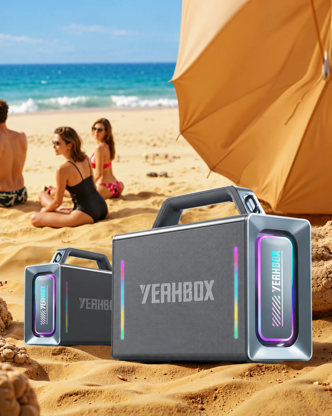 YEAHBOX T500 — Two YEAHBOX T500 speakers placed apart on a beach for TWS stereo listening